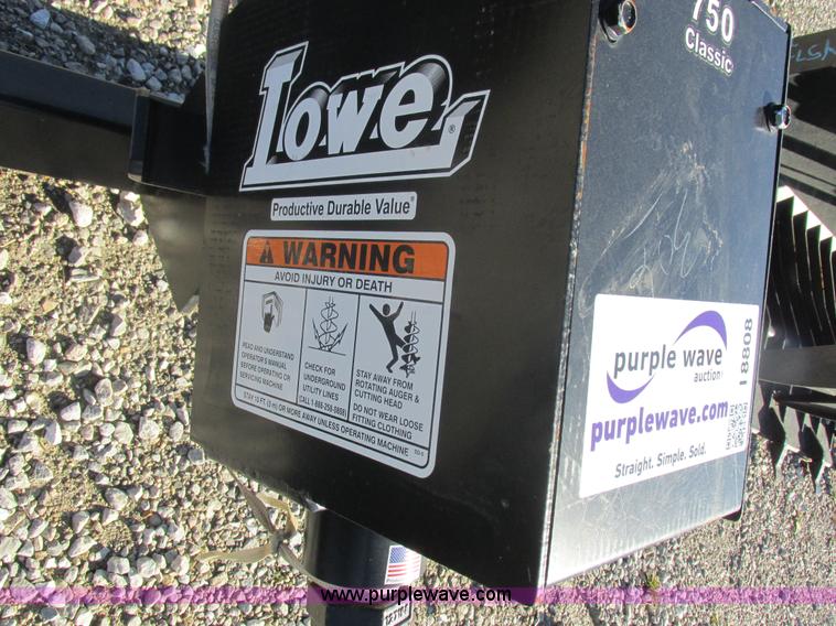 image for item I8808 Lowe 750CLH skid loader auger