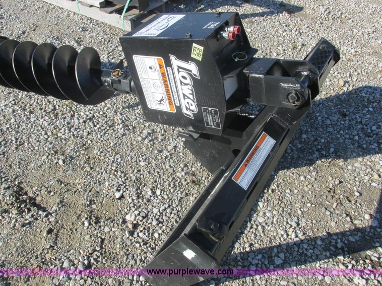 image for item I8808 Lowe 750CLH skid loader auger