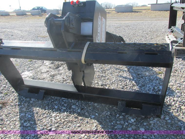 image for item I8808 Lowe 750CLH skid loader auger