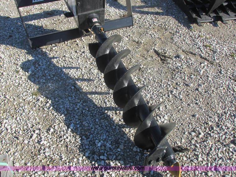 image for item I8808 Lowe 750CLH skid loader auger