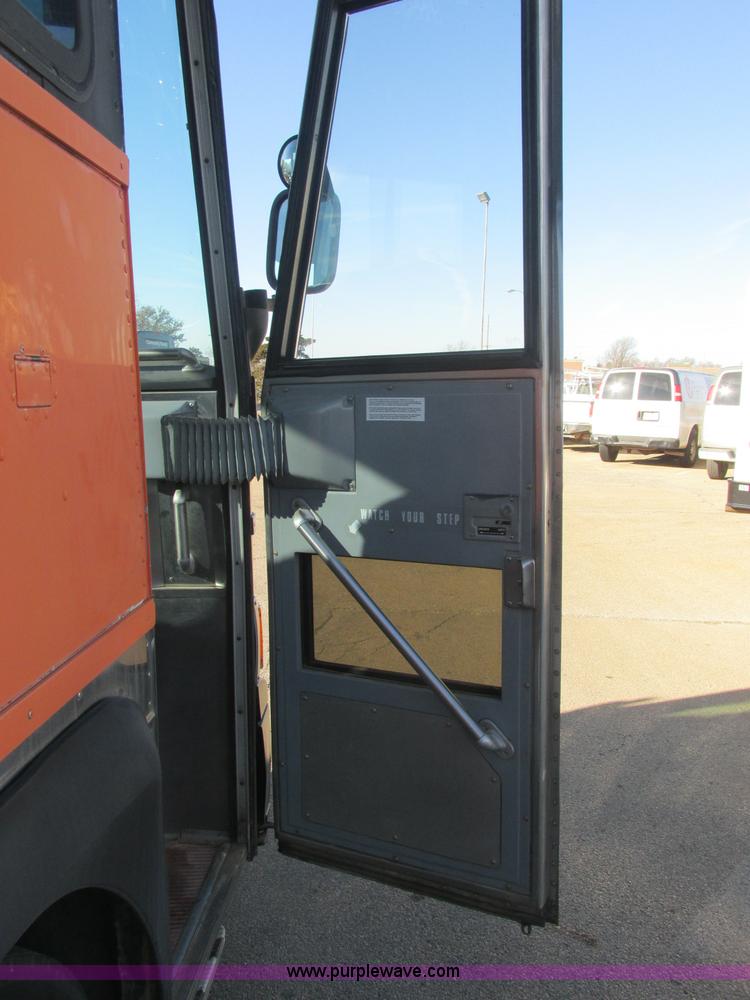 image for item J2326 1987 MCI transit bus