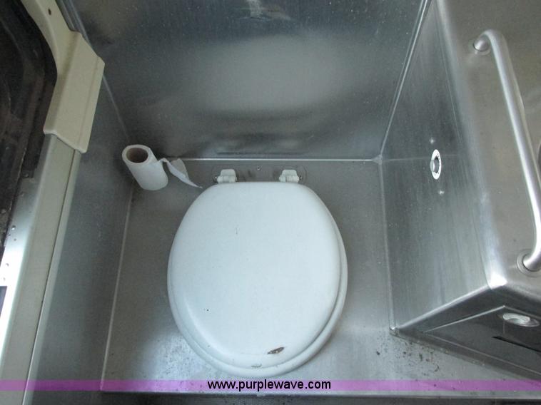 image for item J2326 1987 MCI transit bus