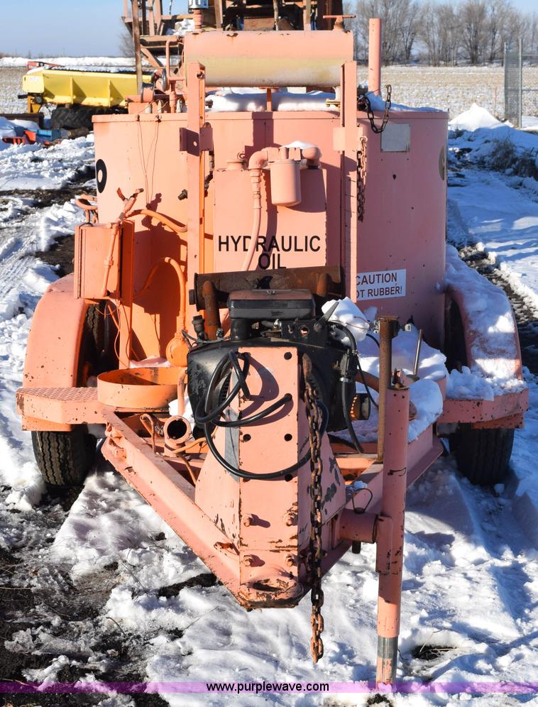 image for item E6060 Crafco EZ 200 pot hole patcher