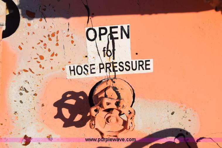 image for item E6060 Crafco EZ 200 pot hole patcher