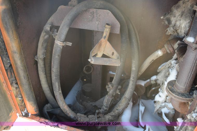 image for item E6060 Crafco EZ 200 pot hole patcher