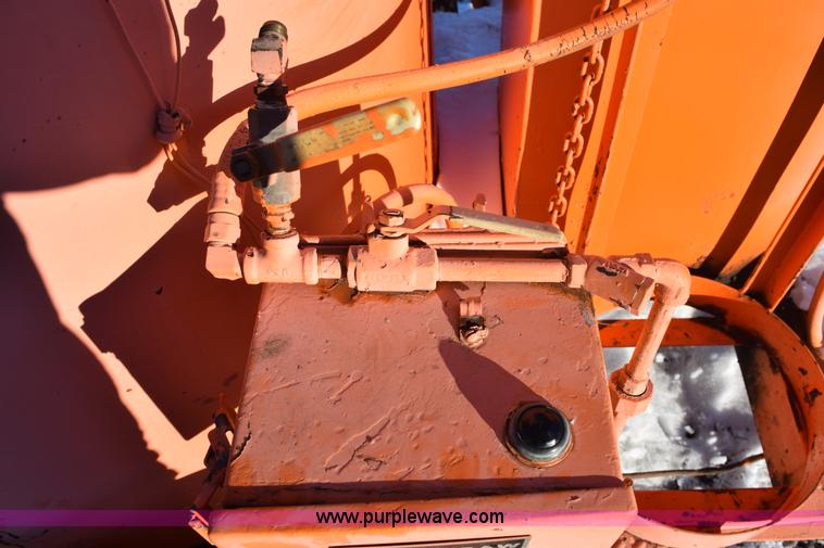 image for item E6060 Crafco EZ 200 pot hole patcher