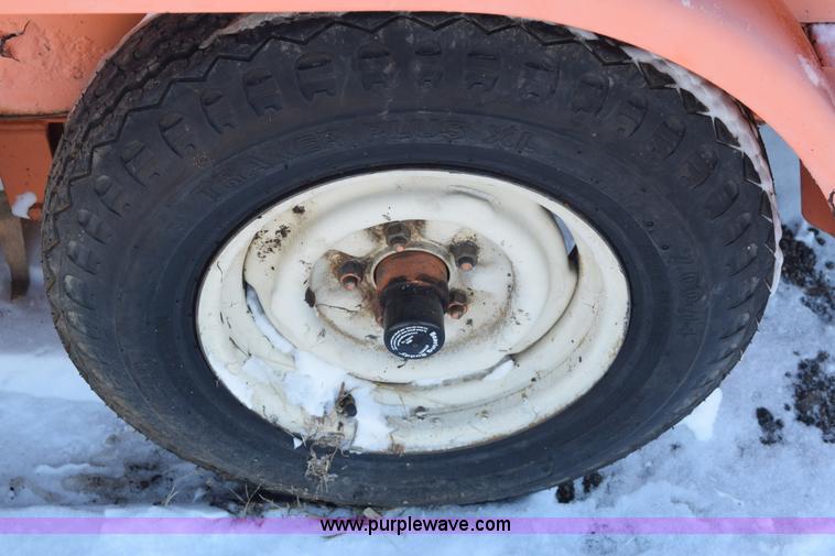 image for item E6060 Crafco EZ 200 pot hole patcher