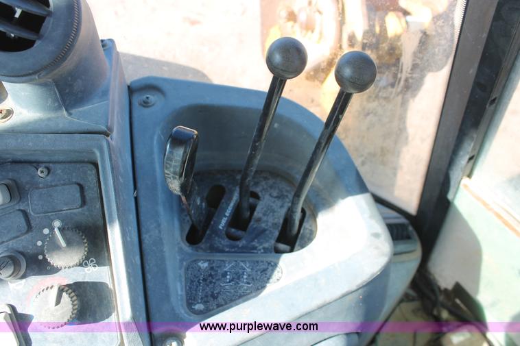 image for item H5968 2005 John Deere 310G backhoe