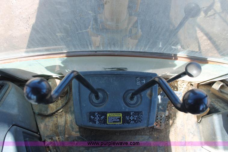 image for item H5968 2005 John Deere 310G backhoe