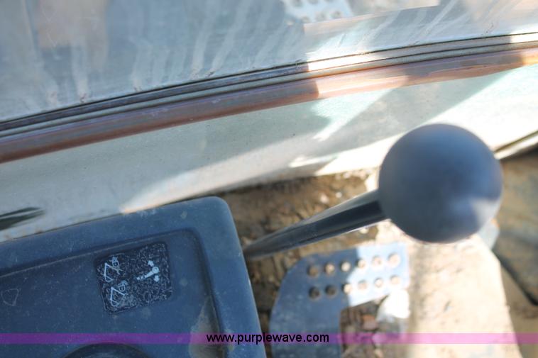 image for item H5968 2005 John Deere 310G backhoe