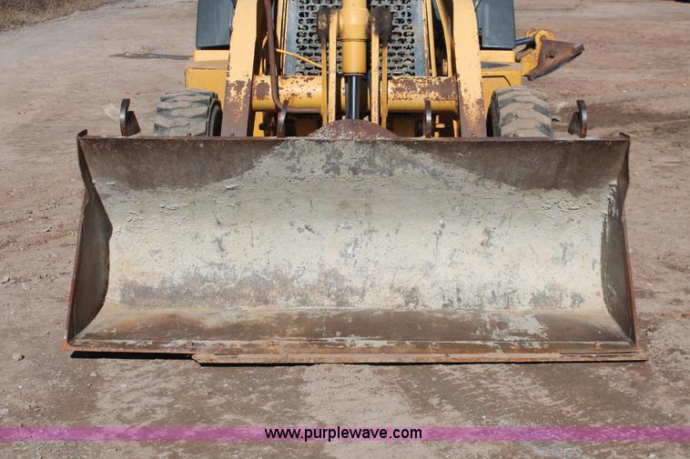 image for item H5968 2005 John Deere 310G backhoe