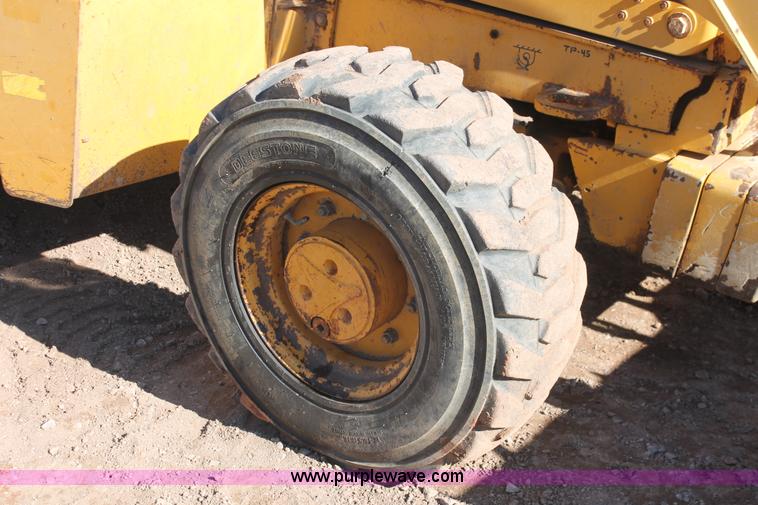 image for item H5968 2005 John Deere 310G backhoe