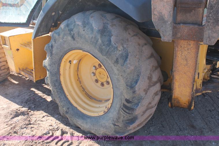 image for item H5968 2005 John Deere 310G backhoe