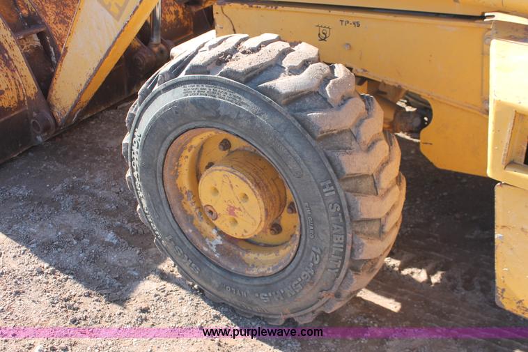 image for item H5968 2005 John Deere 310G backhoe