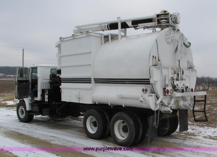 image for item I4086 1998 Volvo WG 64 Jetter vacuum truck