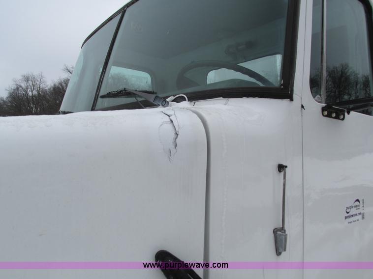 image for item I4086 1998 Volvo WG 64 Jetter vacuum truck