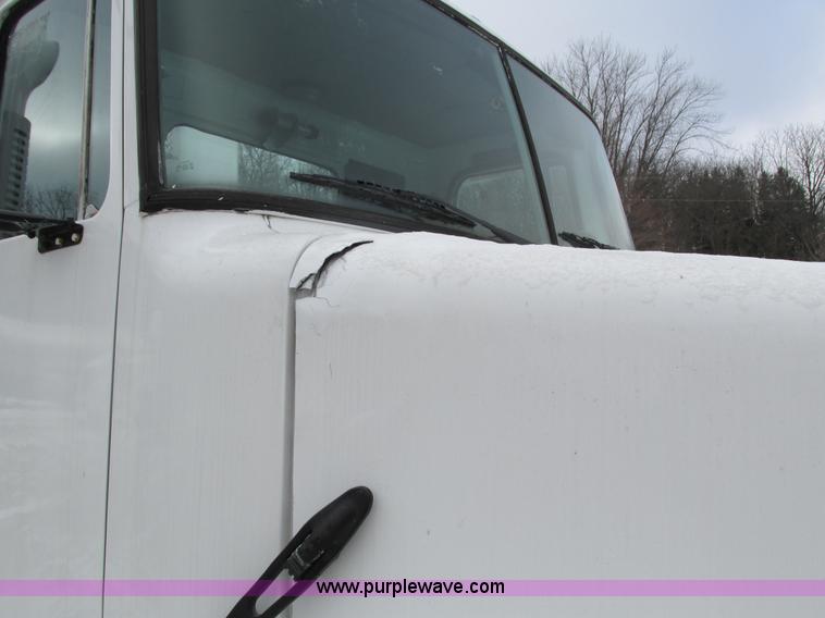 image for item I4086 1998 Volvo WG 64 Jetter vacuum truck