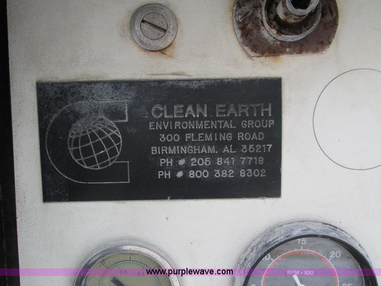 image for item I4086 1998 Volvo WG 64 Jetter vacuum truck