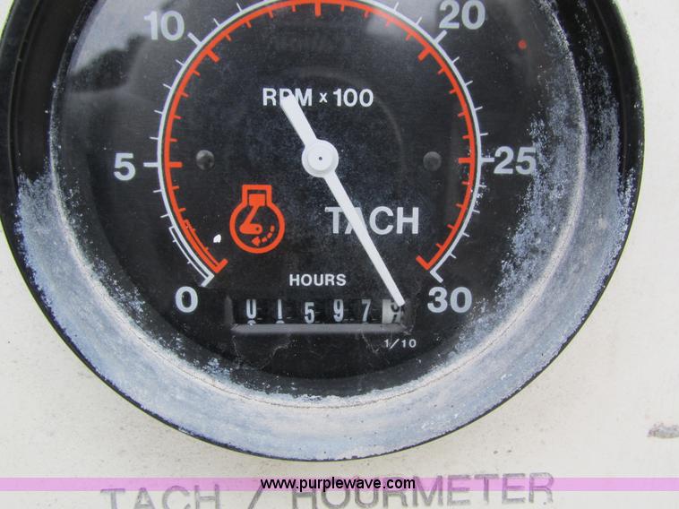 image for item I4086 1998 Volvo WG 64 Jetter vacuum truck