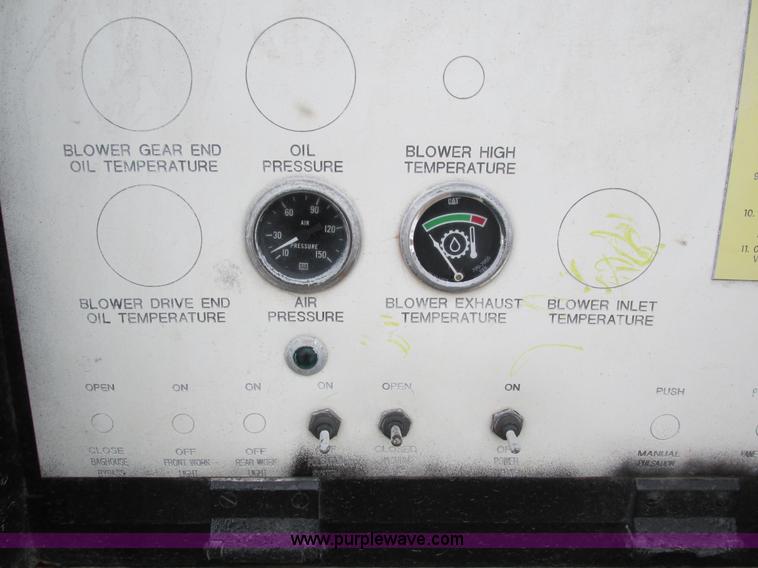 image for item I4086 1998 Volvo WG 64 Jetter vacuum truck