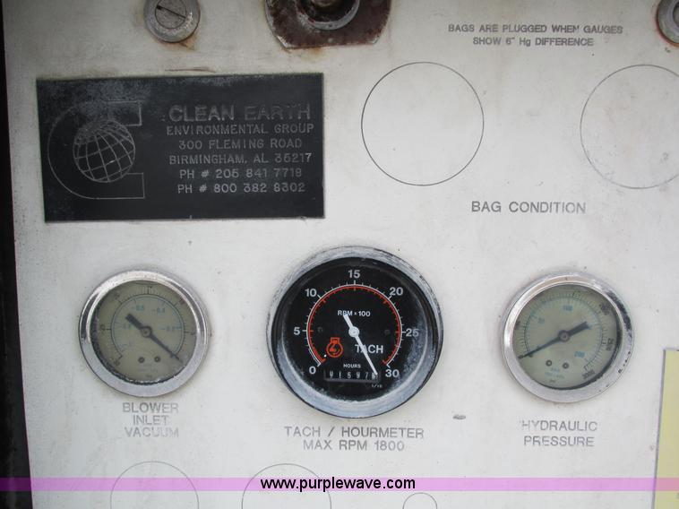 image for item I4086 1998 Volvo WG 64 Jetter vacuum truck