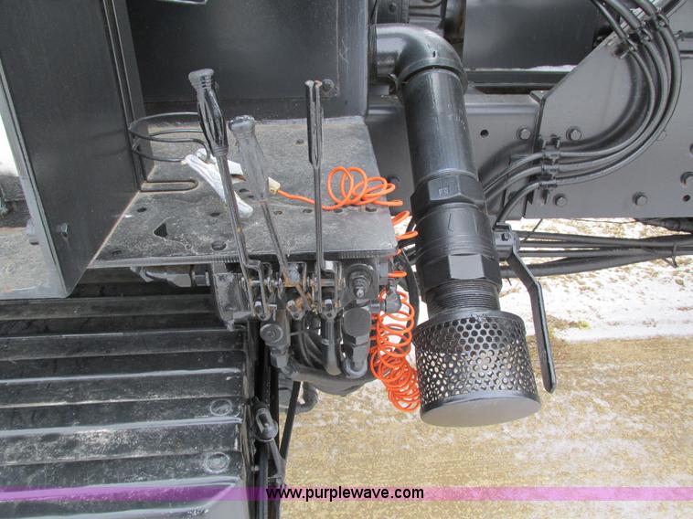 image for item I4086 1998 Volvo WG 64 Jetter vacuum truck