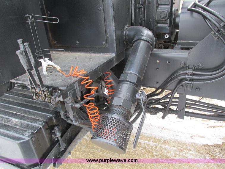 image for item I4086 1998 Volvo WG 64 Jetter vacuum truck