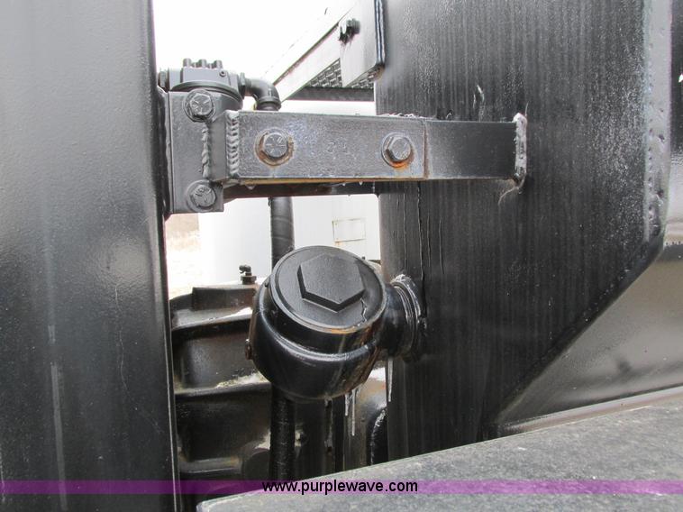 image for item I4086 1998 Volvo WG 64 Jetter vacuum truck