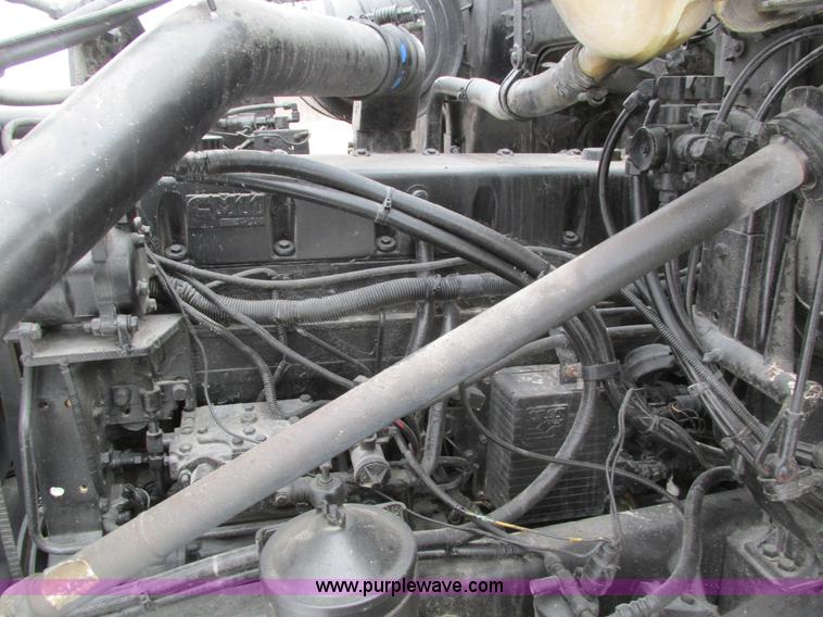 image for item I4086 1998 Volvo WG 64 Jetter vacuum truck