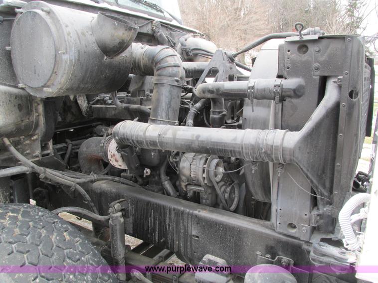image for item I4086 1998 Volvo WG 64 Jetter vacuum truck