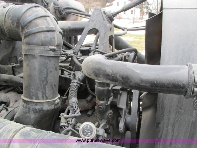 image for item I4086 1998 Volvo WG 64 Jetter vacuum truck