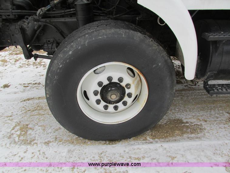 image for item I4086 1998 Volvo WG 64 Jetter vacuum truck