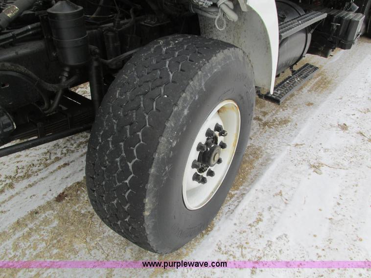 image for item I4086 1998 Volvo WG 64 Jetter vacuum truck