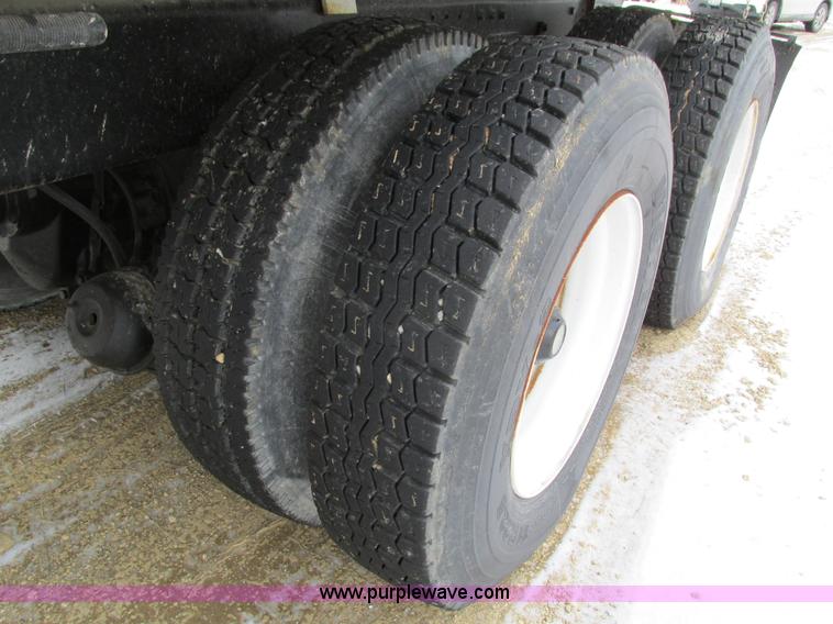 image for item I4086 1998 Volvo WG 64 Jetter vacuum truck