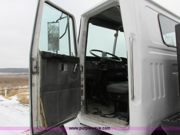 image for item I4086 1998 Volvo WG 64 Jetter vacuum truck