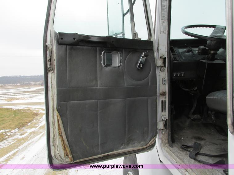 image for item I4086 1998 Volvo WG 64 Jetter vacuum truck