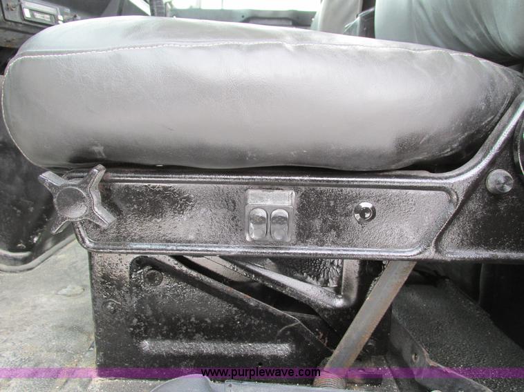 image for item I4086 1998 Volvo WG 64 Jetter vacuum truck