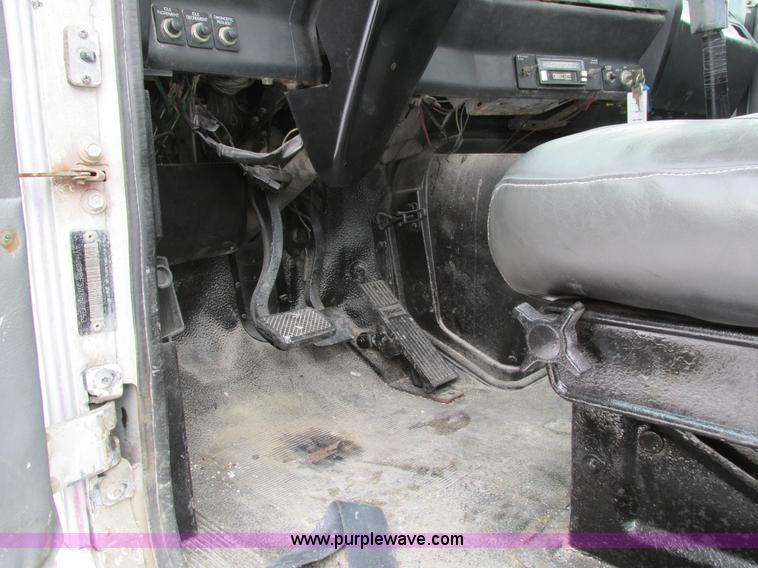 image for item I4086 1998 Volvo WG 64 Jetter vacuum truck