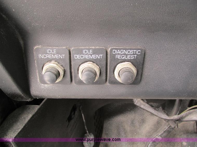 image for item I4086 1998 Volvo WG 64 Jetter vacuum truck