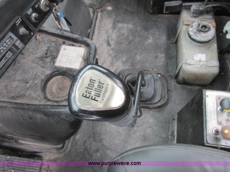 image for item I4086 1998 Volvo WG 64 Jetter vacuum truck