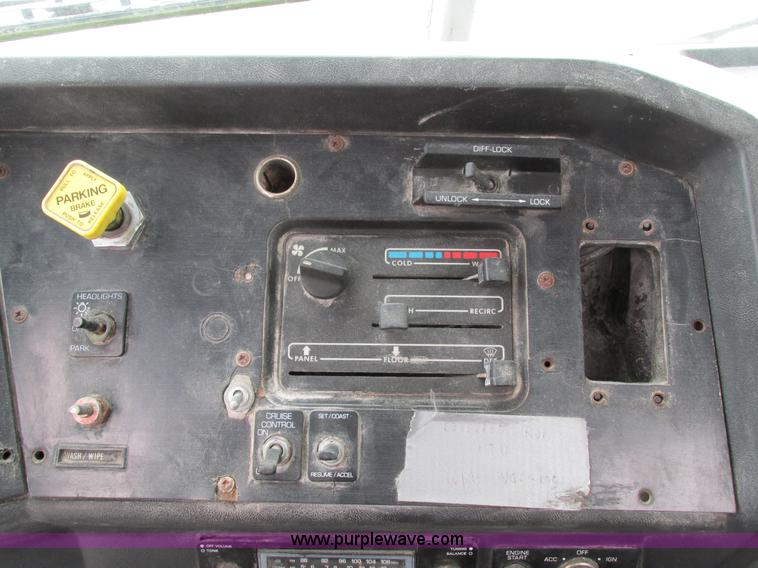 image for item I4086 1998 Volvo WG 64 Jetter vacuum truck