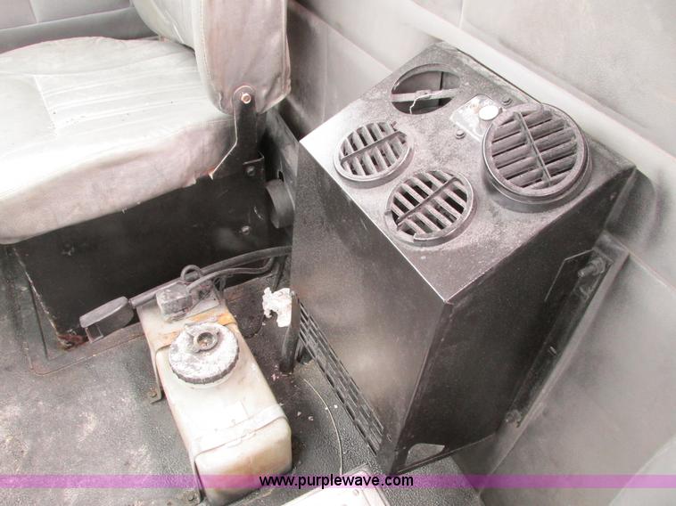 image for item I4086 1998 Volvo WG 64 Jetter vacuum truck