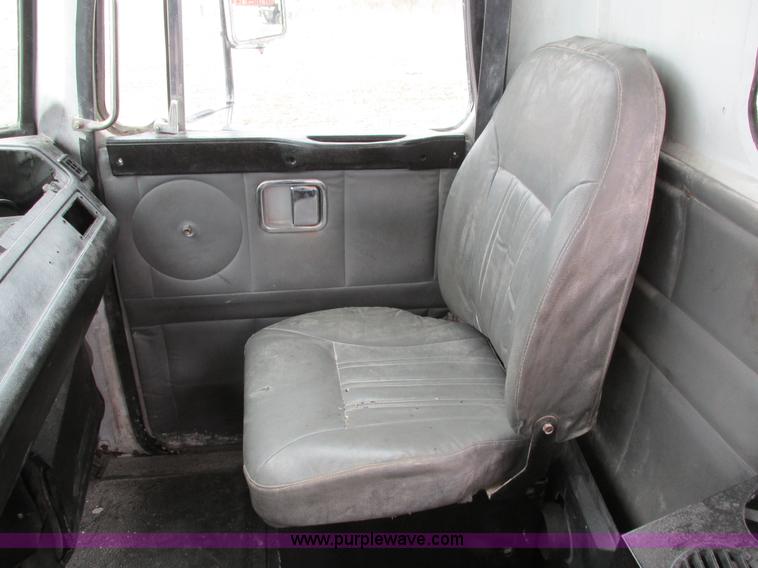 image for item I4086 1998 Volvo WG 64 Jetter vacuum truck