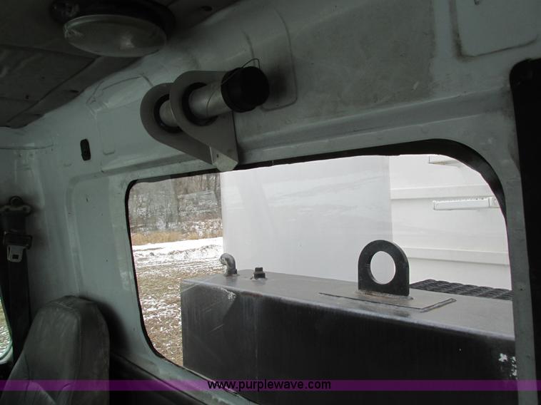 image for item I4086 1998 Volvo WG 64 Jetter vacuum truck