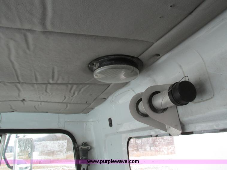 image for item I4086 1998 Volvo WG 64 Jetter vacuum truck