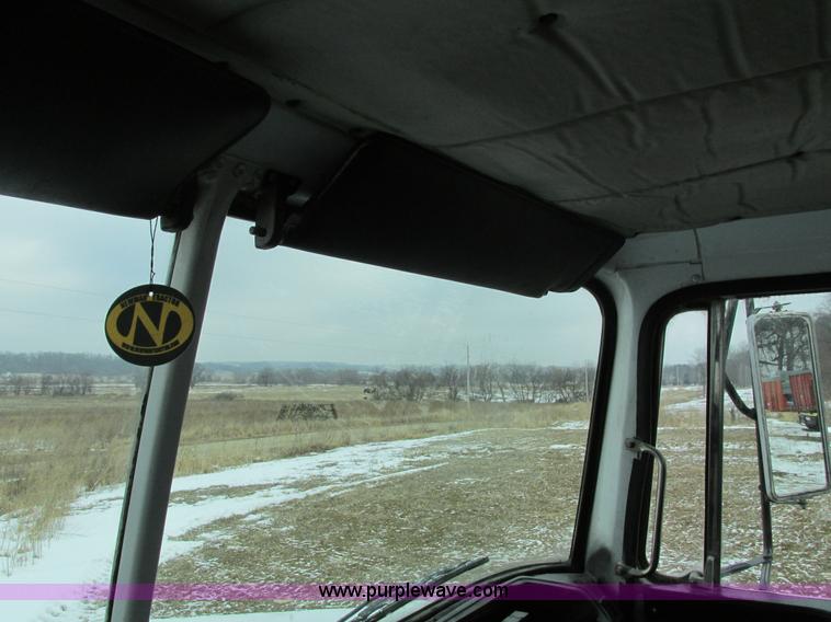 image for item I4086 1998 Volvo WG 64 Jetter vacuum truck