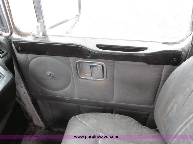 image for item I4086 1998 Volvo WG 64 Jetter vacuum truck