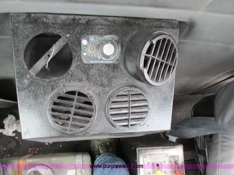 image for item I4086 1998 Volvo WG 64 Jetter vacuum truck