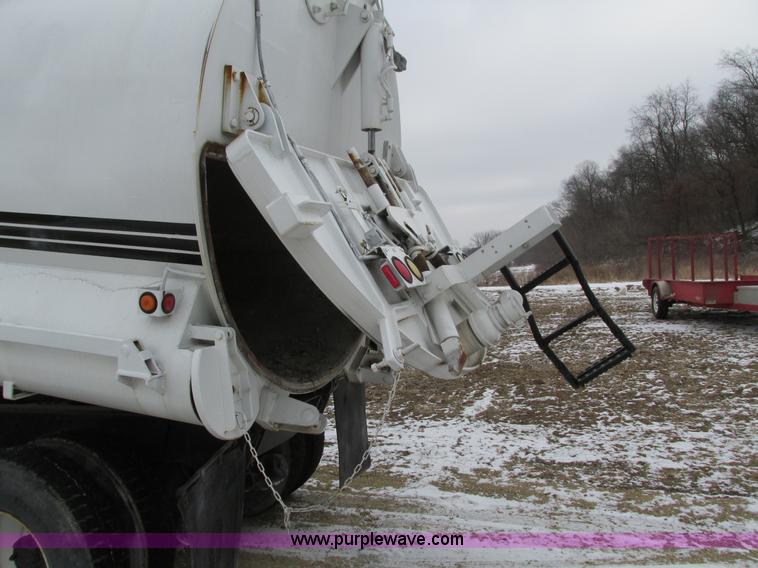 image for item I4086 1998 Volvo WG 64 Jetter vacuum truck