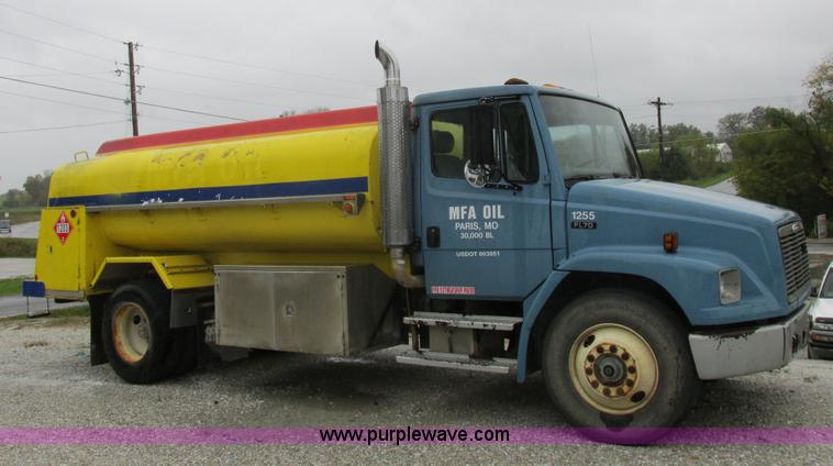 image for item I8910 1999 Freightliner FL70 fuel truck
